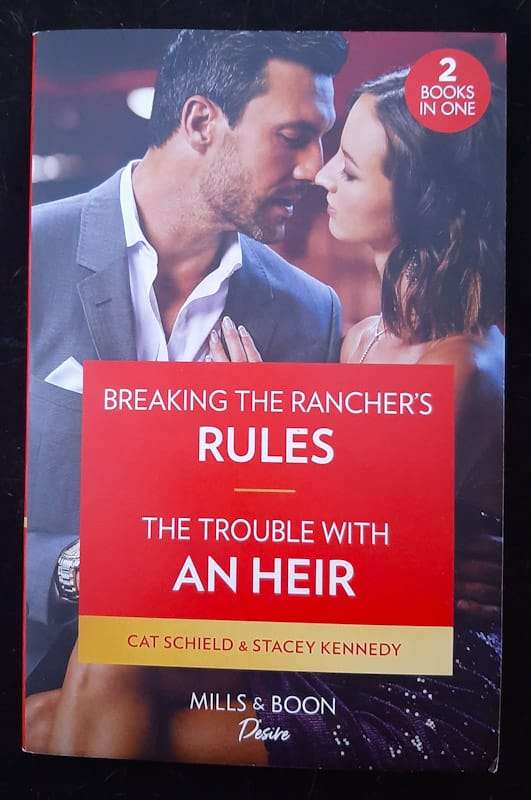 Breaking The Rancher's Rules / The Trouble With An Heir - 2 Books in 1 (Cat Schield and Stacey Ke...