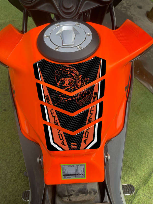 KTM Orange and Black Carbon Fibre 390 Adventure.  A universal Tank Pad which fits most 390 Advent...