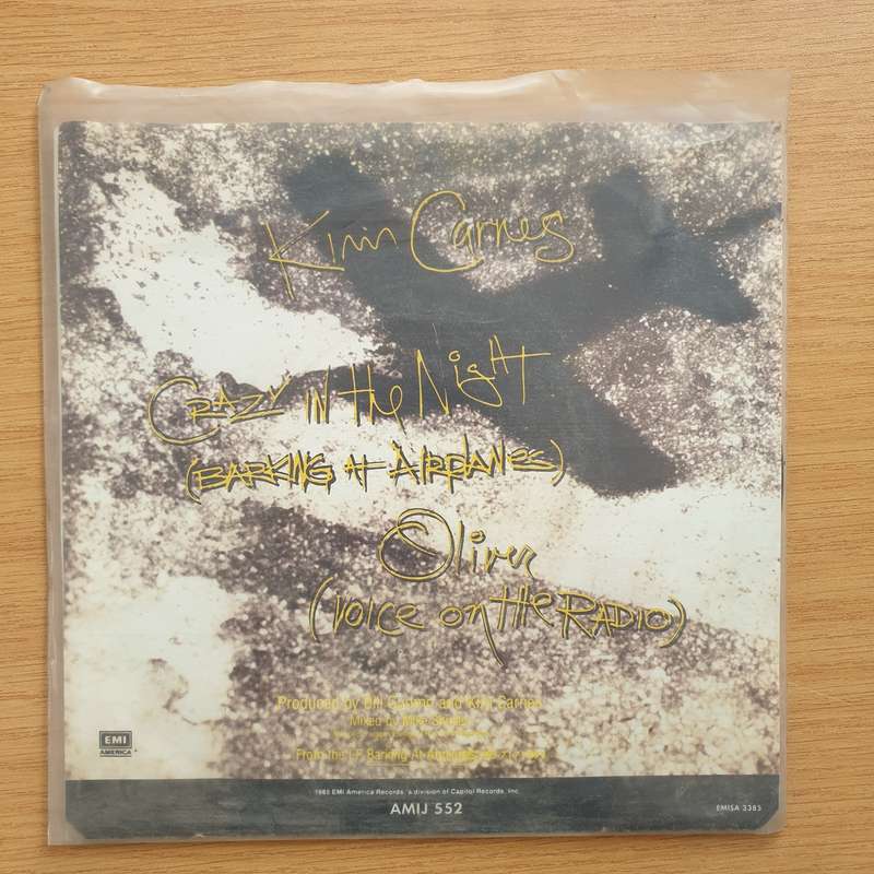 Kim Carnes  Crazy In The Night (Barking At Airplanes) - Vinyl 7" Record - Very-Good+ Quality (...