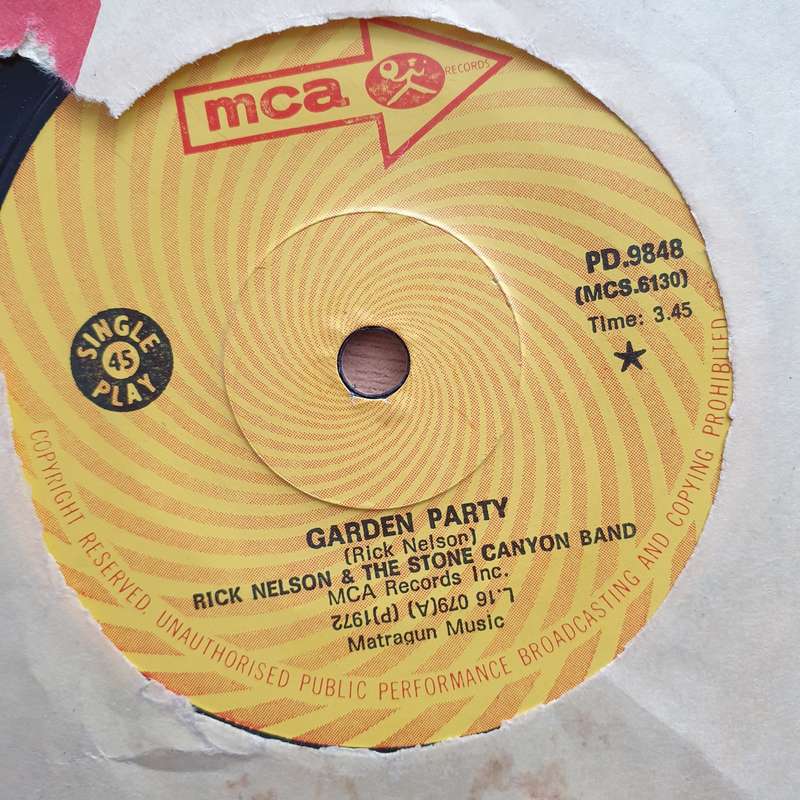 Rick Nelson & The Stone Canyon Band  Garden Party - Vinyl 7" Record - Very-Good+ Quality (VG+)...