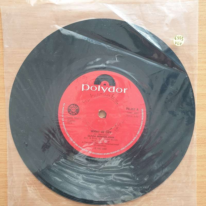 Olivia Newton-John  What Is Life - Vinyl 7" Record - Very-Good+ Quality (VG+) (verygoodplus7)