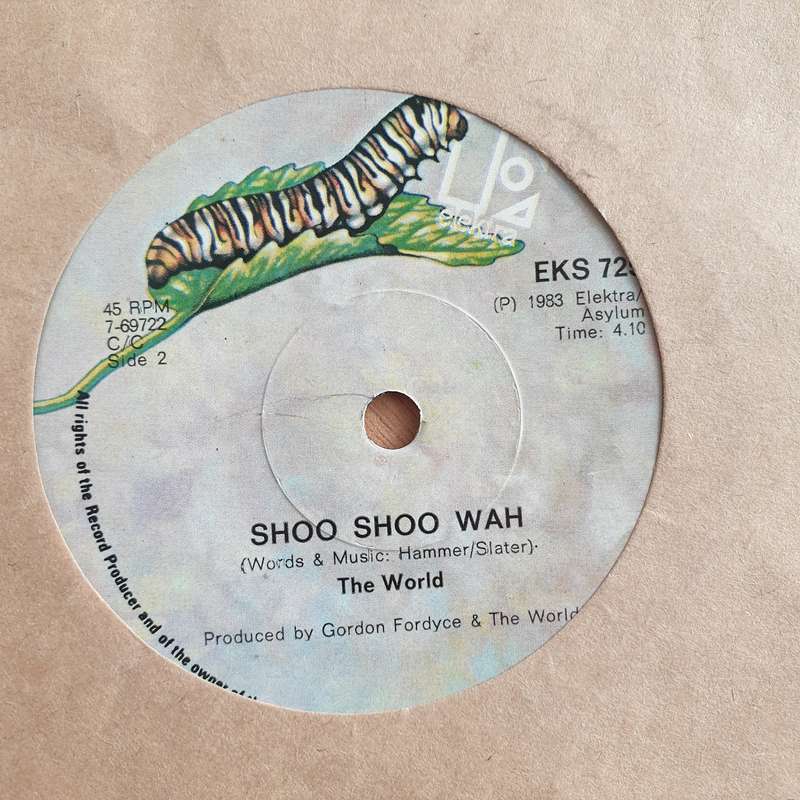 The World  Shoo Shoo Wah - Vinyl 7" Record - Very-Good+ Quality (VG+) (verygoodplus7)