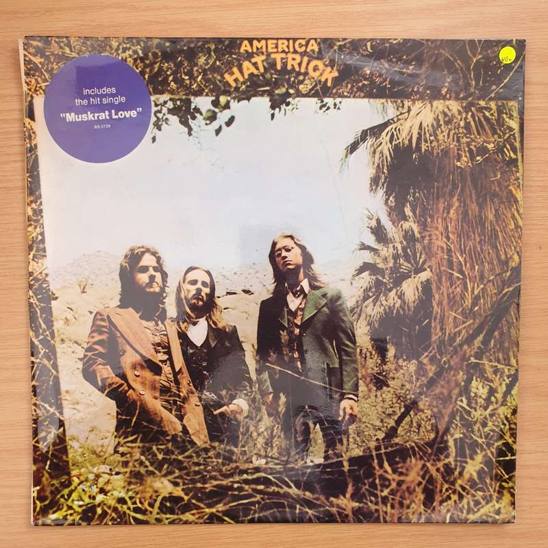 America  Hat Trick - Vinyl LP Record - Very-Good+ Quality (VG+)