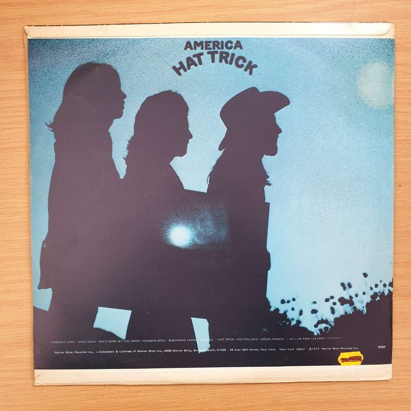 America  Hat Trick - Vinyl LP Record - Very-Good+ Quality (VG+)