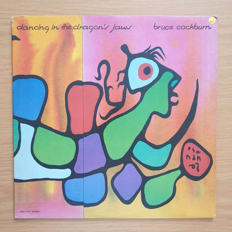 Bruce Cockburn  Dancing In The Dragon's Jaws  Vinyl LP Record - Very-Good+ Quality (VG+) (v...