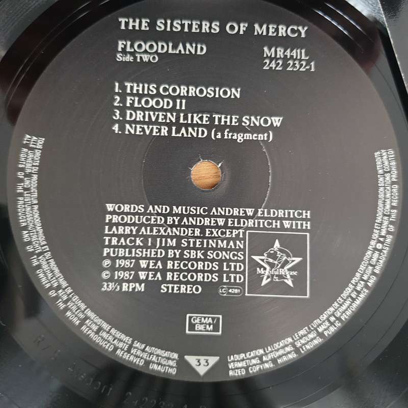 The Sisters Of Mercy  Floodland (Import)  (with lyrics sheet) - Vinyl LP Record - Very-Good+ Q...