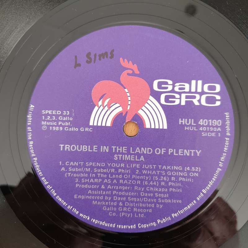 Stimela  Trouble In The Land Of The Plenty - Vinyl LP Record - Very-Good Quality (VG)  (verry)
