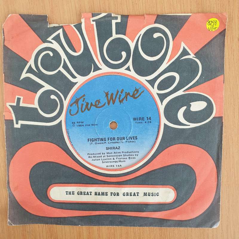 Shiraz  Fighting For Our Lives - 7" Record - Very-Good+ Quality (VG+) (verygoodplus7) (DLB)