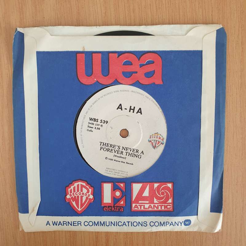 a-ha  The Living Daylights - 7" Record - Very-Good+ Quality (VG+) (verygoodplus7) (DLB)