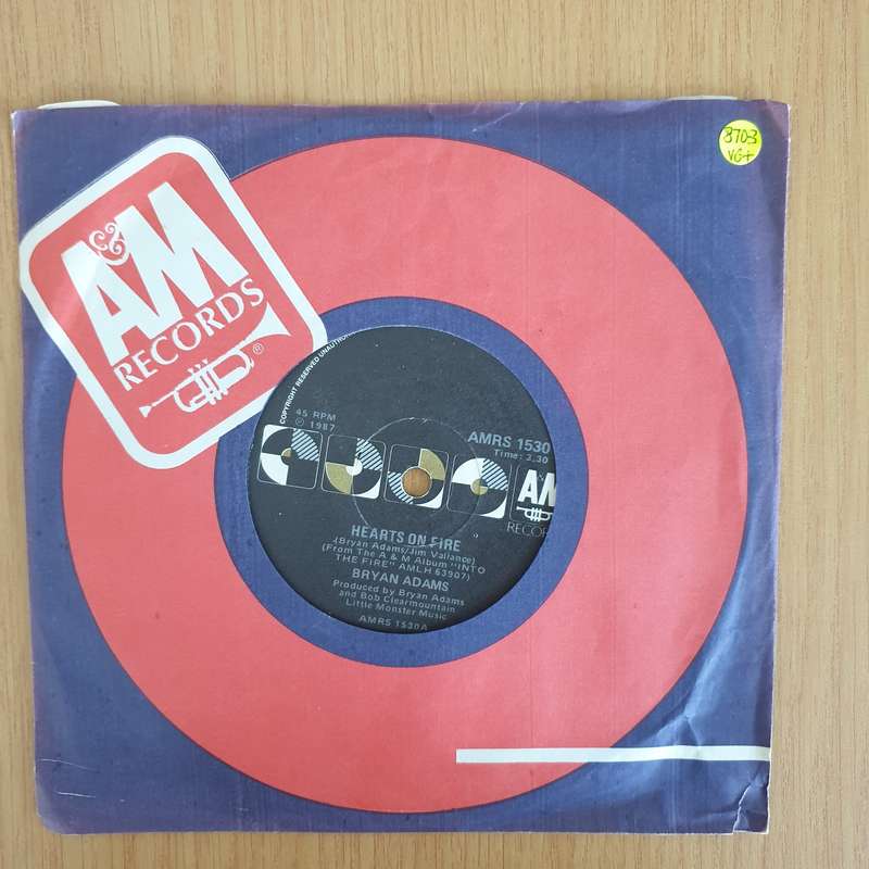 Bryan Adams  Hearts On Fire - 7" Record - Very-Good+ Quality (VG+) (verygoodplus7) (DLB)