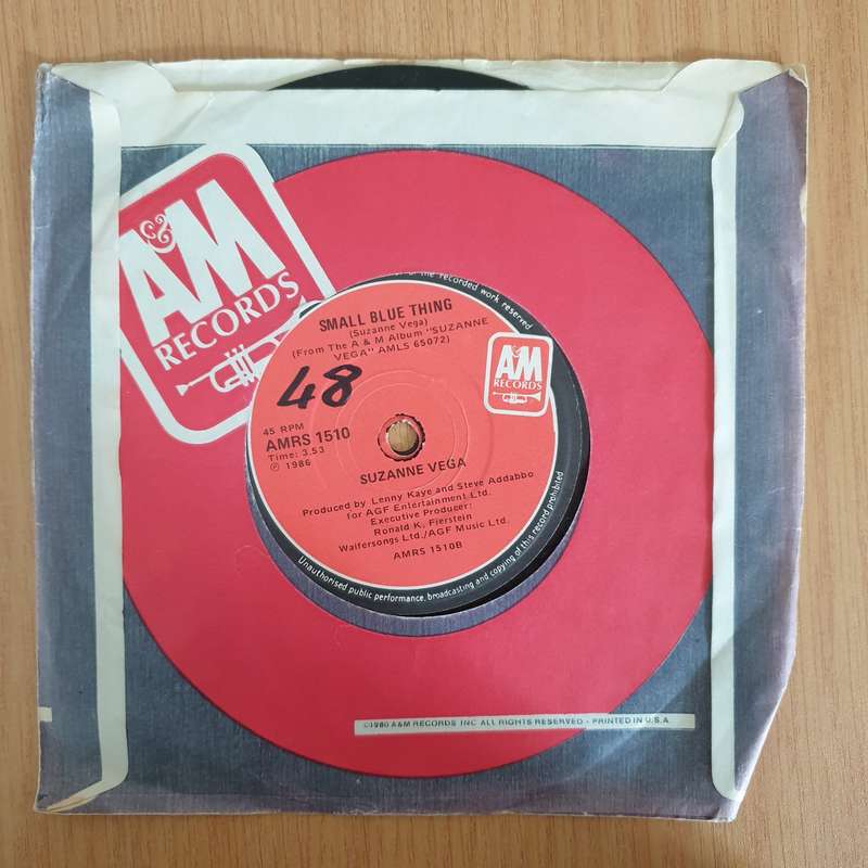 Suzanne Vega  Left Of Center - 7" Vinyl Record  (VG+) (DLB)