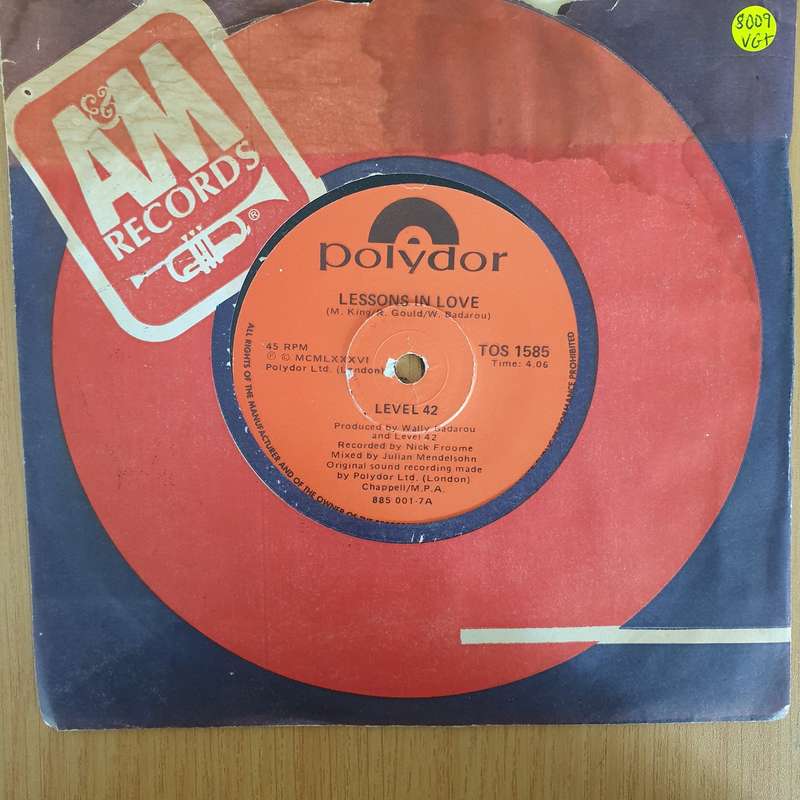 Level 42  Lessons In Love - 7" Vinyl Record  (VG+) (DLB)