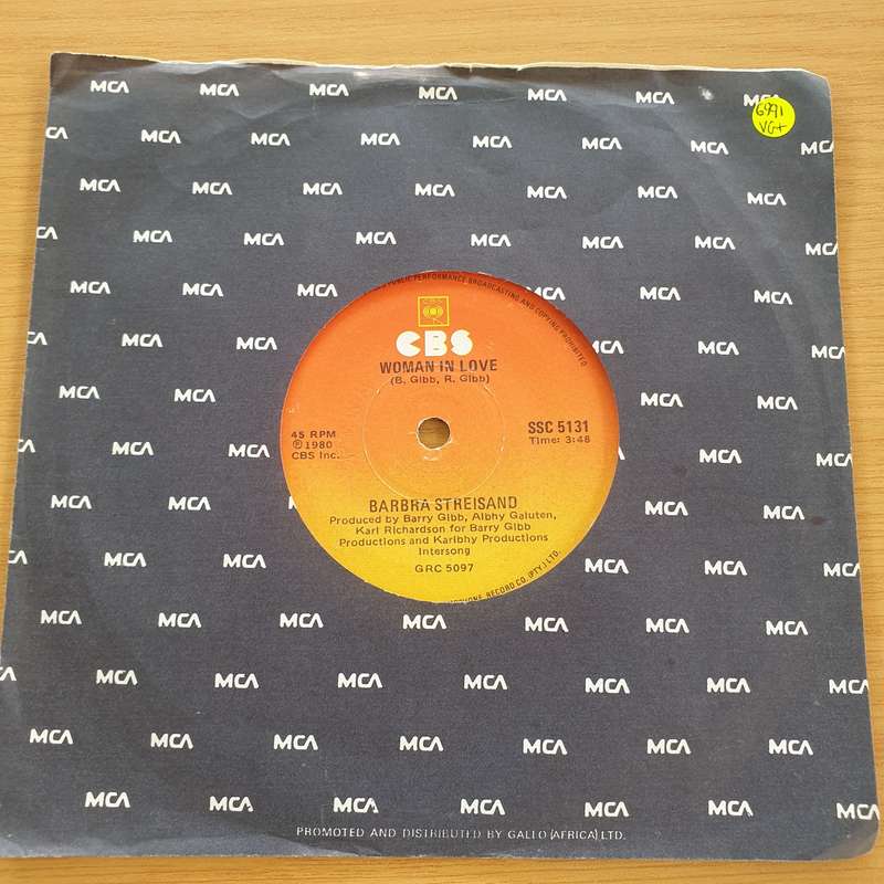Barbra Streisand  Woman In Love  - Vinyl 7" Record  (VG+)