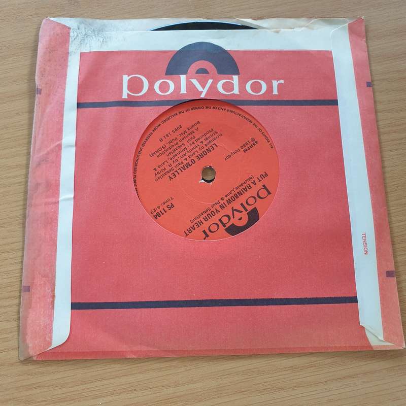Lenore O'Malley  First... Be A Woman  - Vinyl 7" Record (VG+)