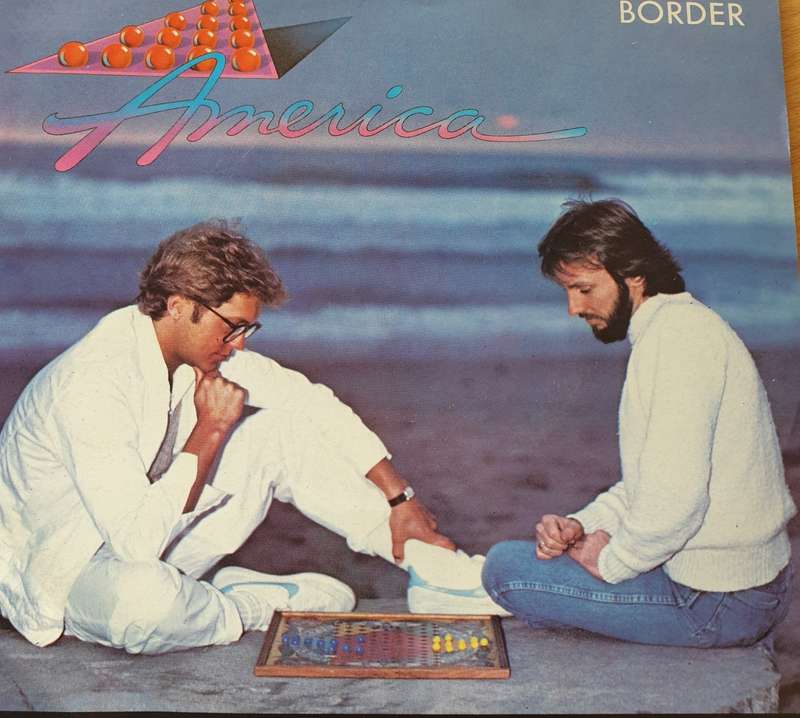 America  The Border - Vinyl 7" Record (VG+)