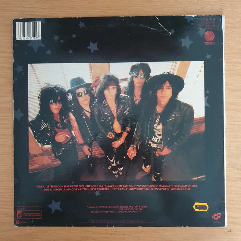 L.A. Guns  Cocked & Loaded - Vinyl LP Record (VG)