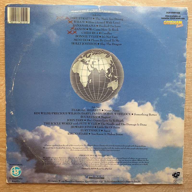 Rock The World - Vinyl LP Record - Opened  - Very-Good- Quality (VG-)