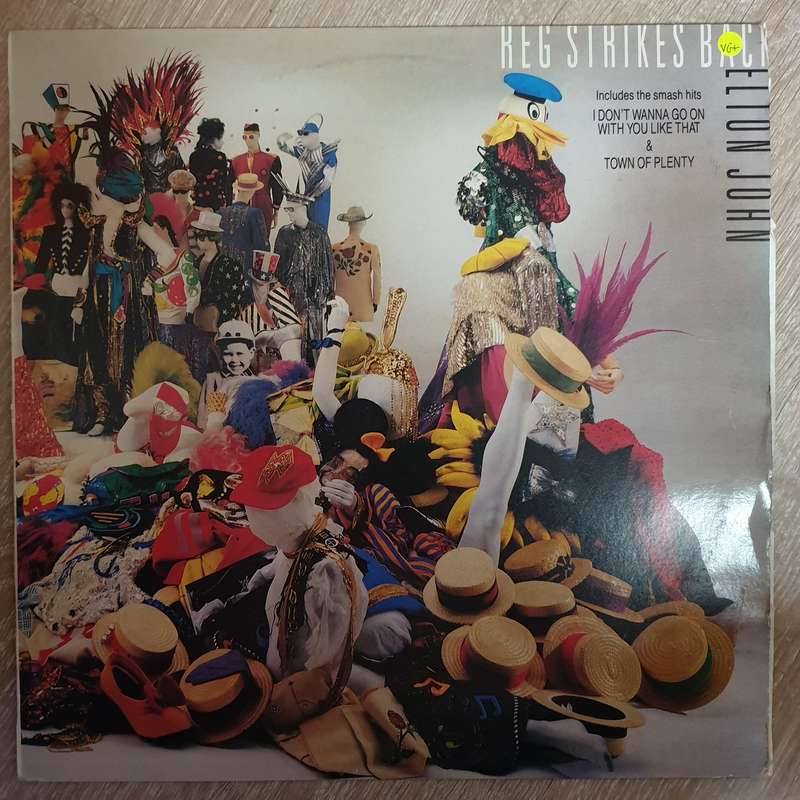 Elton John - Reg Strikes Back - Vinyl LP Record - Very-Good+ Quality (VG+)