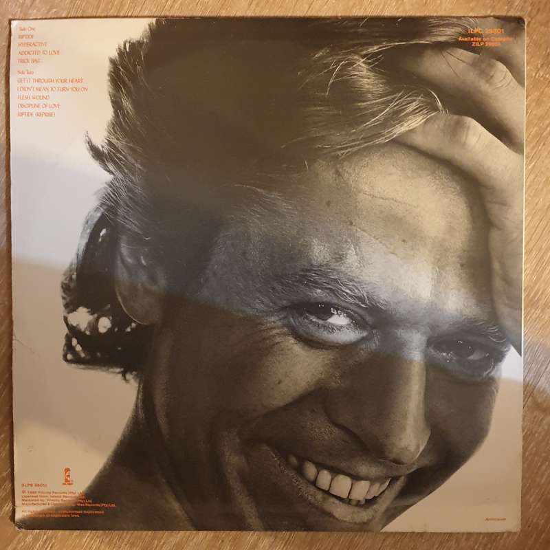 Robert Palmer  Riptide- Vinyl  Record - Very-Good+ Quality (VG+)
