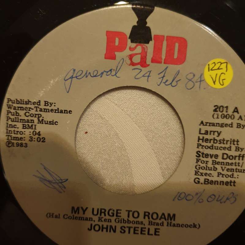 John Steele  My Urge To Roam  - Vinyl 7" Record - Opened  - Very-Good Quality (VG)