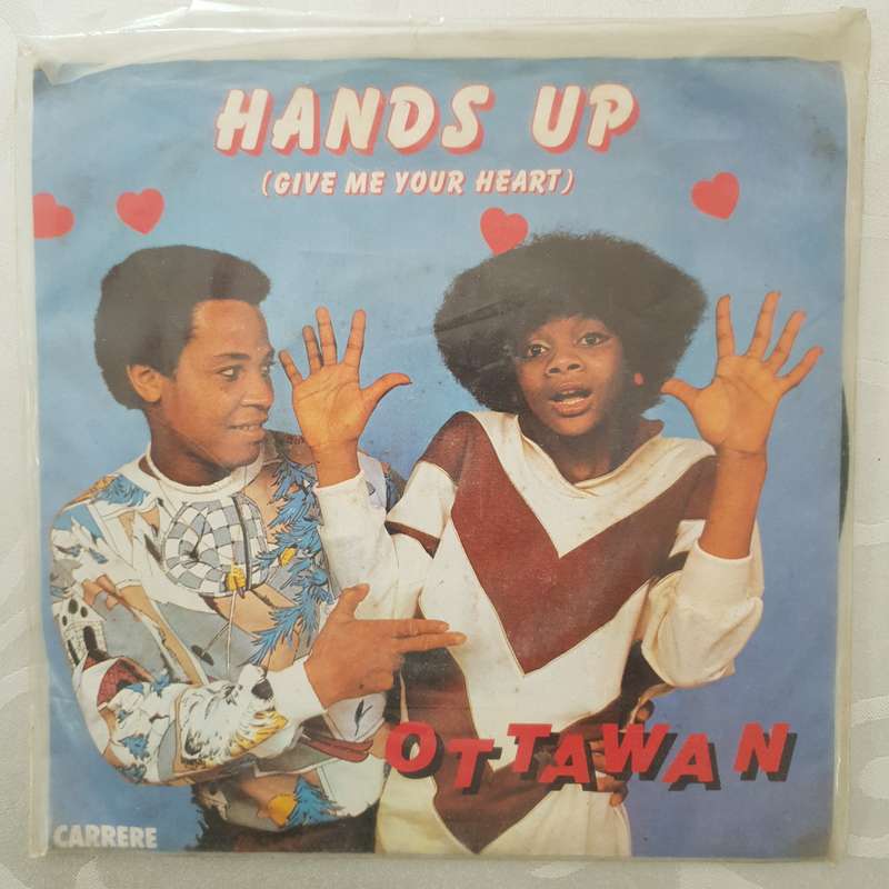 Ottawan  Hands Up (Give Me Your Heart) - Vinyl 7" Record - Opened  - Good+ Quality (G+)