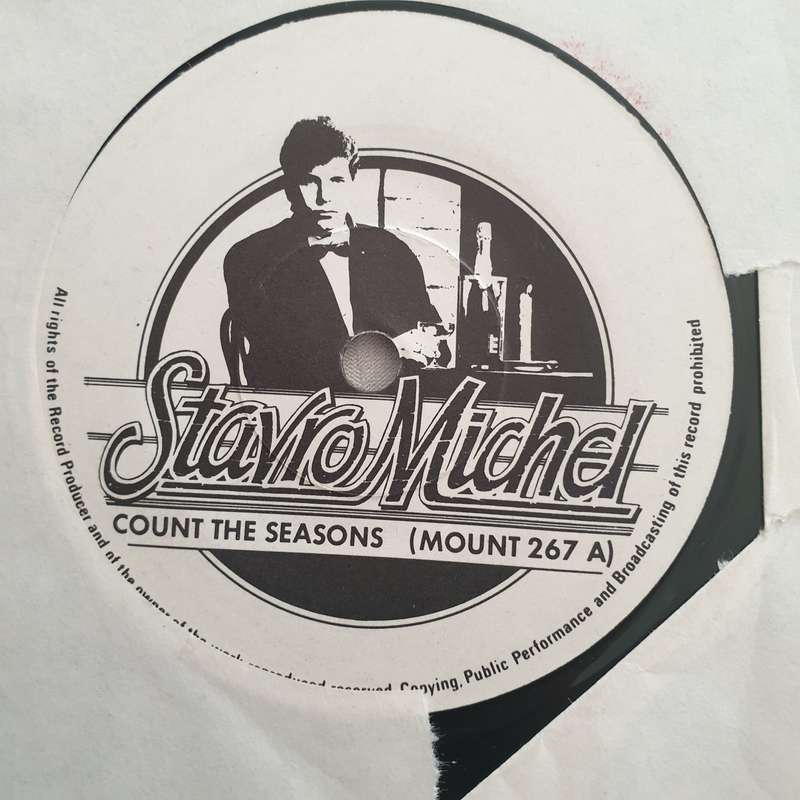 Stavro Michel  Count The Seasons - Vinyl 7" Record - Opened  - Very-Good Quality (VG)