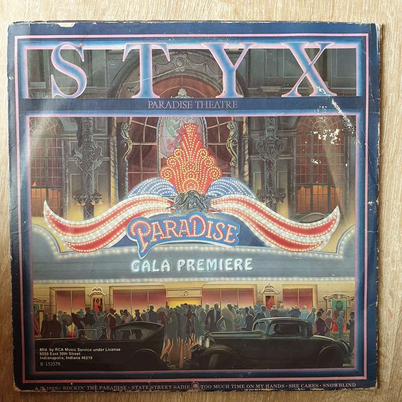 Styx - Paradise Theatre (With Lazer Picture Engraving)  Vinyl LP Record - Very-Good  Quality (VG)