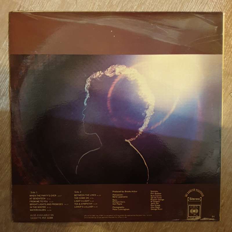 Janis Ian  Between The Lines - Vinyl LP Record - Opened  - Very-Good  Quality (VG)