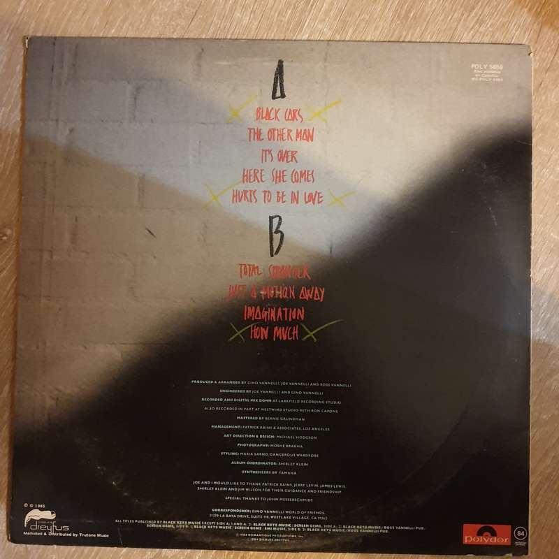 Gino Vannelli  Black Cars - Vinyl LP Record - Opened  - Very-Good- Quality (VG-)