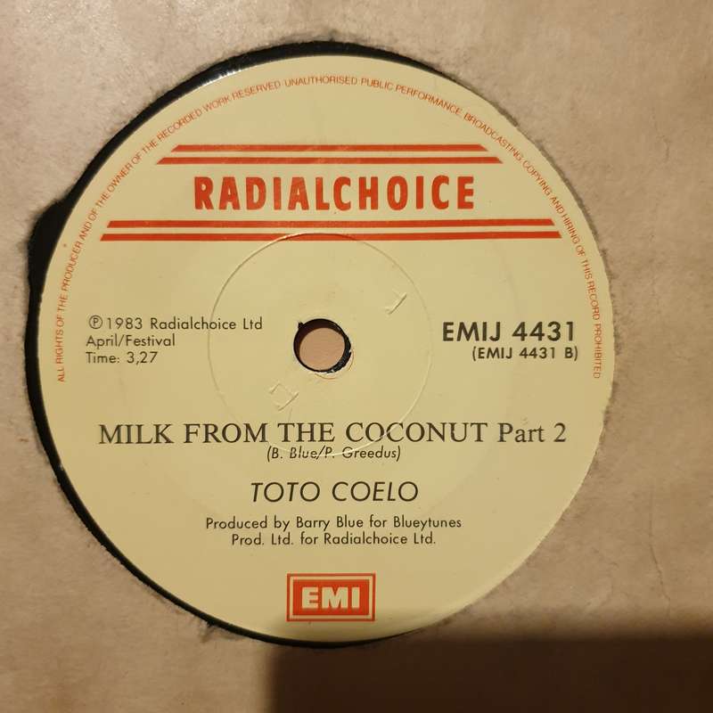 Toto Coelo  Milk From The Coconut - Vinyl 7" Record - Opened  - Very-Good Quality (VG)
