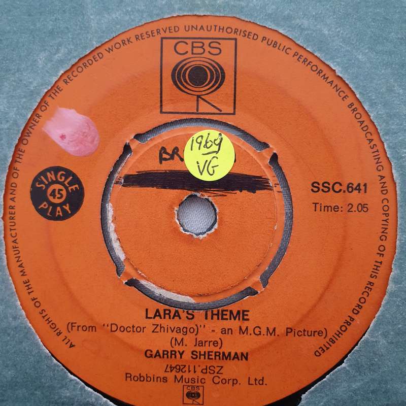 Garry Sherman  Lara's Theme / The Farewell Trumpet - Vinyl 7" Record - Opened  - Very-Good-...