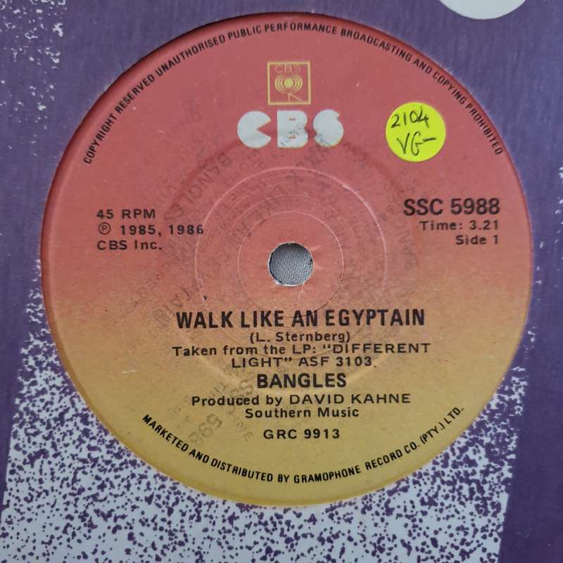 Bangles  Walk Like An Egyptian  - Vinyl 7" Record - Very-Good- Quality (VG-)