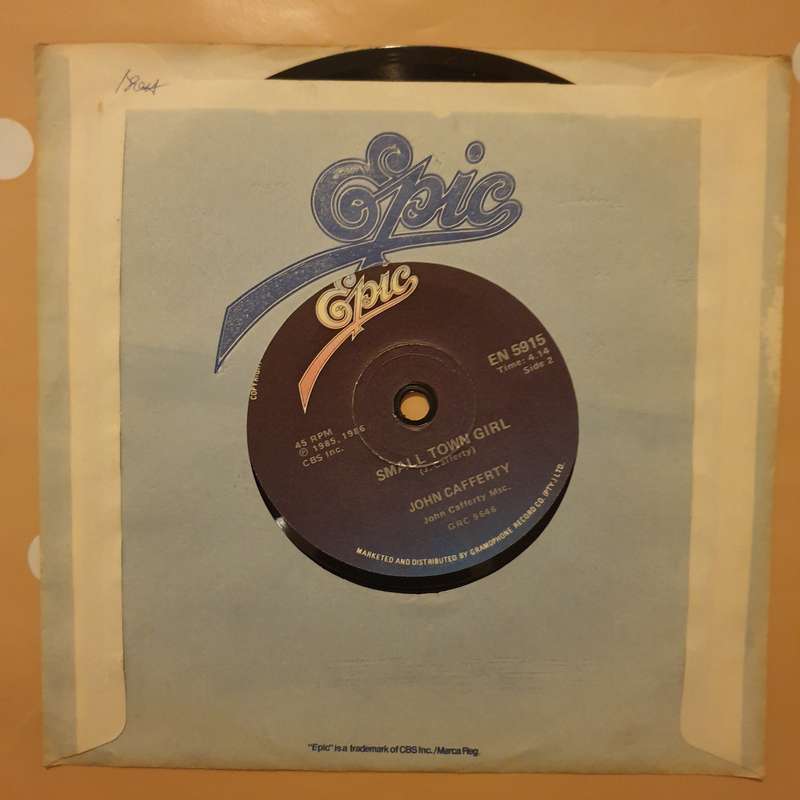 John Cafferty  Heart's On Fire - Vinyl 7" Record - Very-Good+ Quality (VG+)