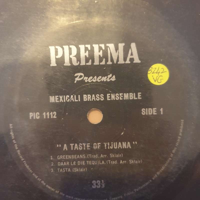 Sam Sklair, Mexicali Brass Ensemble  A Taste Of Tijuana - Vinyl 7" Record - Very-Good Quali...