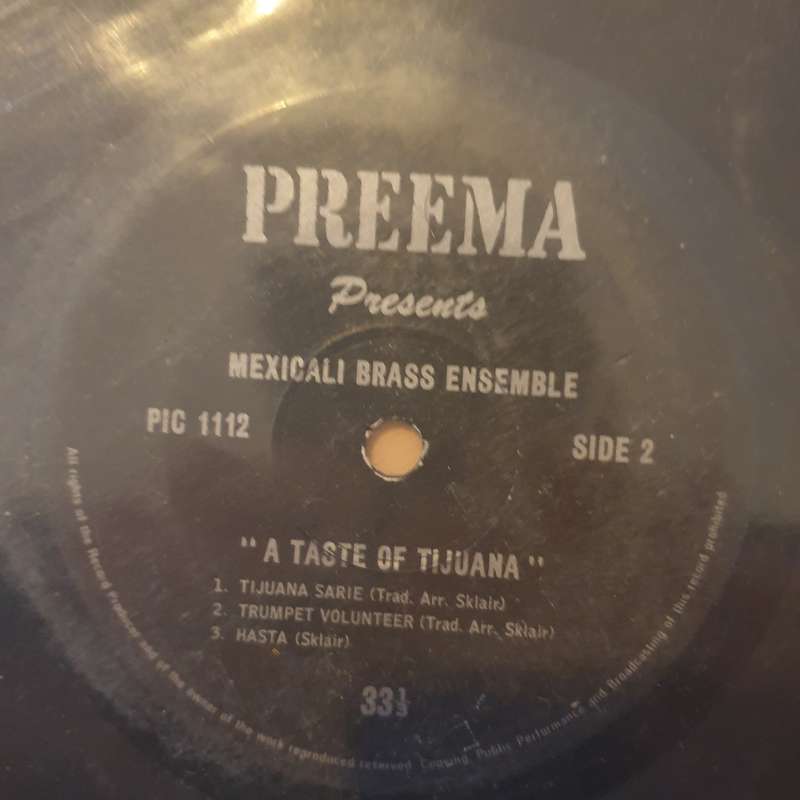 Sam Sklair, Mexicali Brass Ensemble  A Taste Of Tijuana - Vinyl 7" Record - Very-Good Quali...
