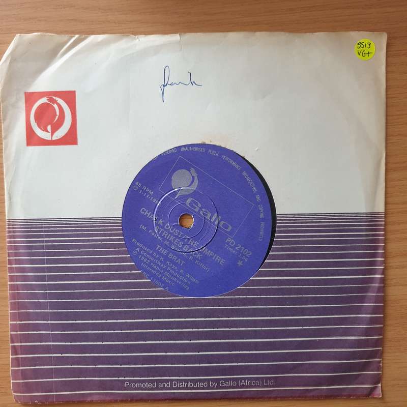 The Brat  Chalk Dust - The Umpire Strikes Back - Vinyl 7" Record - Very-Good+ Quality (VG+) (v...