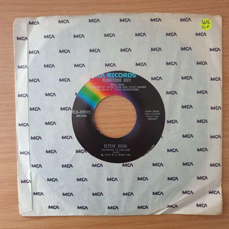 Elton John  Ego / Flinstone Boy - Vinyl 7" Record - Very-Good+ Quality (VG+) (verygoodplus)