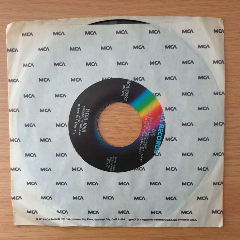 Elton John  Ego / Flinstone Boy - Vinyl 7" Record - Very-Good+ Quality (VG+) (verygoodplus)