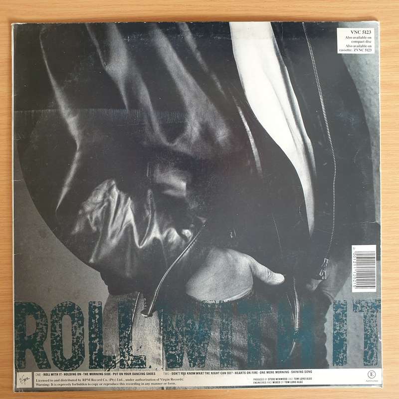 Steve Winwood  Roll With It - Vinyl LP Record - Very-Good+ Quality (VG+) (verygoodplus)