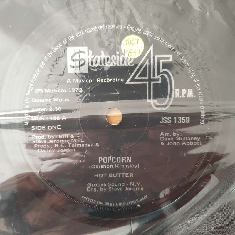 Hot Butter  Popcorn / At The Movies - Vinyl 7" Record - Very-Good+ Quality (VG+) (verygoodplus)