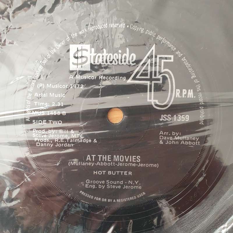 Hot Butter  Popcorn / At The Movies - Vinyl 7" Record - Very-Good+ Quality (VG+) (verygoodplus)