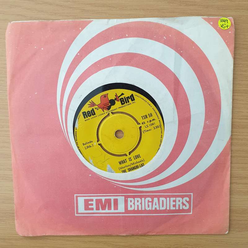 The Shangri-Las  Leader Of The Pack / What Is Love - Vinyl 7" Record - Very-Good+ Quality (VG+...