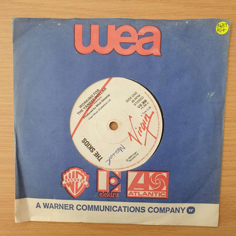 Skids  Working For The Yankee Dollar - Vinyl 7" Record - Very-Good+ Quality (VG+) (verygoodplus)