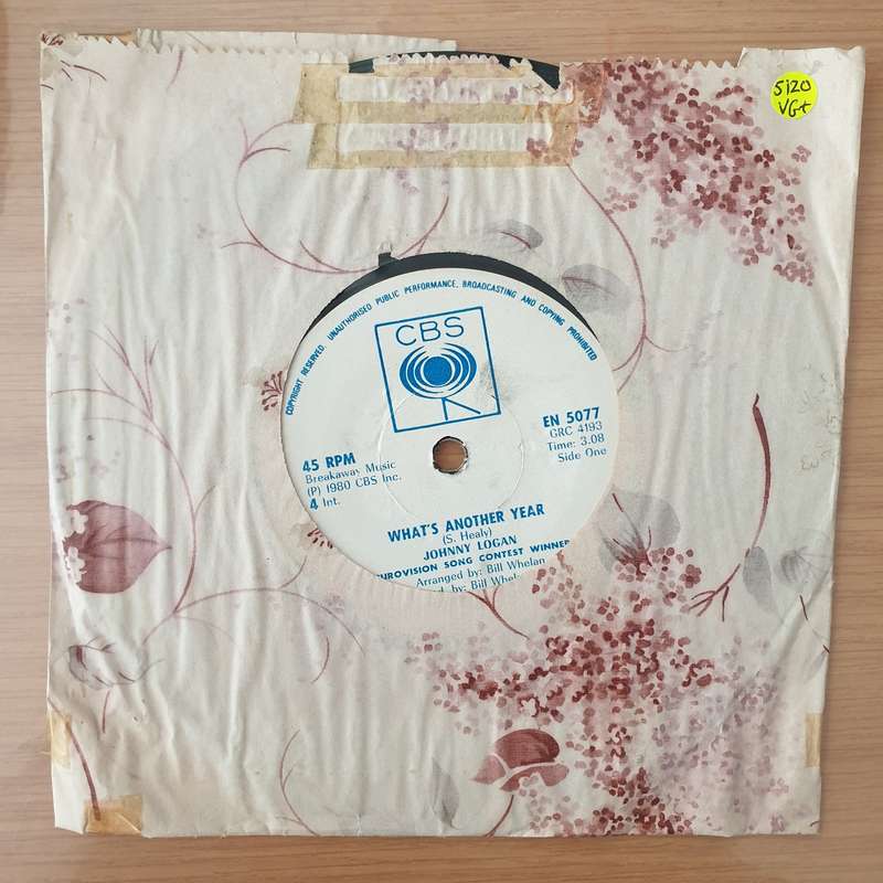 Johnny Logan  What's Another Year! (Rhodesia) -  Vinyl 7" Record - Very-Good+ Quality (VG+) (v...