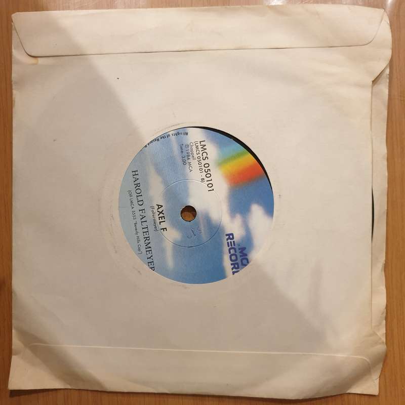 Glenn Frey  The Heat Is On - Vinyl 7" Record - Very-Good+ Quality (VG+) (verygoodplus)