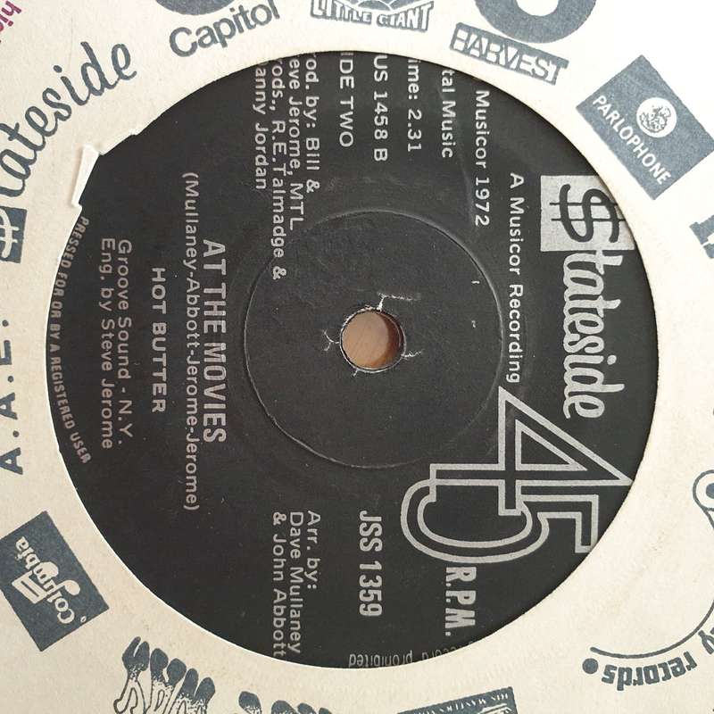 Hot Butter  Popcorn / At The Movies - Vinyl 7" Record - Very-Good+ Quality (VG+) (verygoodplus)