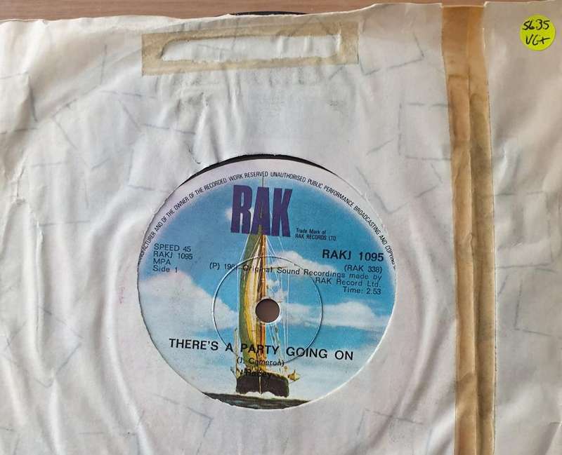 Racey  There's A Party Going On - Vinyl 7" Record - Very-Good+ Quality (VG+) (verygoodplus)