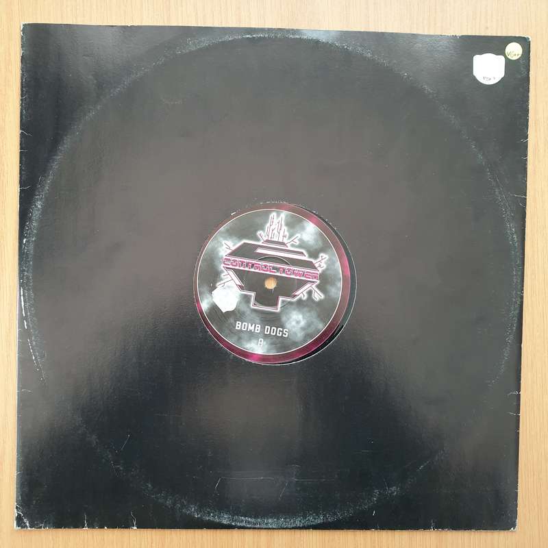 Bomb Dogs  Through The Wires / A Touch Of The Old...  Vinyl LP Record - Very-Good+ Quality ...