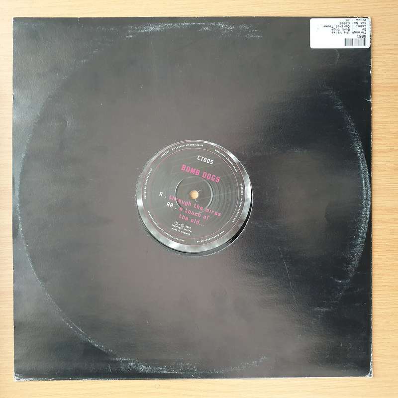 Bomb Dogs  Through The Wires / A Touch Of The Old...  Vinyl LP Record - Very-Good+ Quality ...