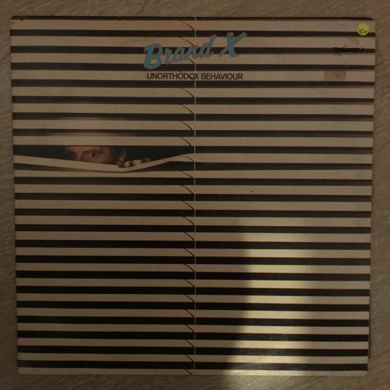 Brand X  Unorthodox Behaviour- Vinyl LP Record - Opened  - Very-Good+ Quality (VG+)
